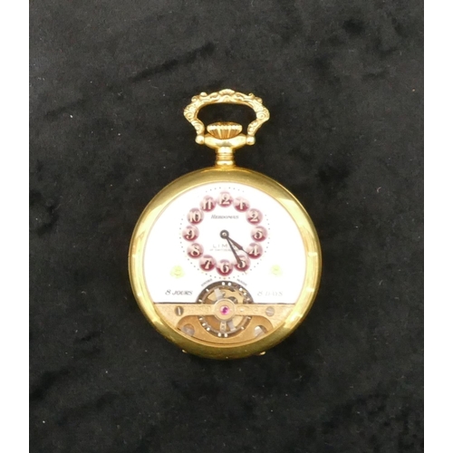 460 - A Hebdomas open faced pocket watch with red jewelled Arabic numerals, visible escapement