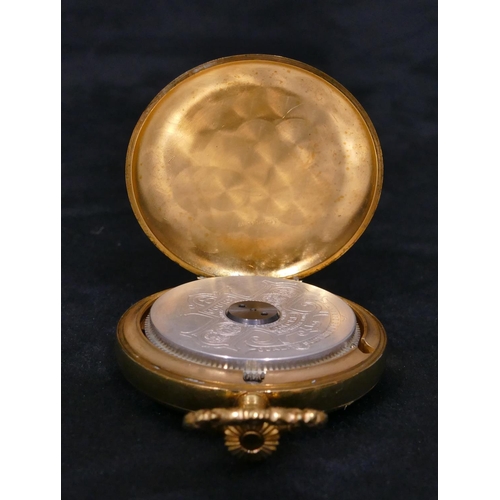 460 - A Hebdomas open faced pocket watch with red jewelled Arabic numerals, visible escapement