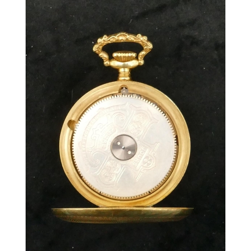 460 - A Hebdomas open faced pocket watch with red jewelled Arabic numerals, visible escapement