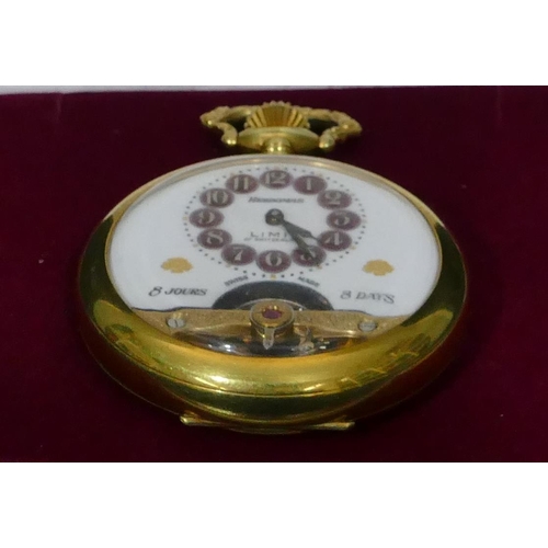 460 - A Hebdomas open faced pocket watch with red jewelled Arabic numerals, visible escapement