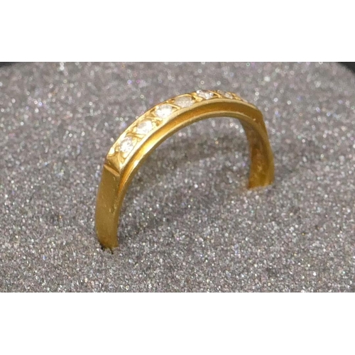 466 - An 18ct gold half eternity ring, set with 7 diamonds, Size S, 3.6 grams gross