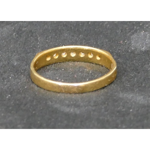 466 - An 18ct gold half eternity ring, set with 7 diamonds, Size S, 3.6 grams gross