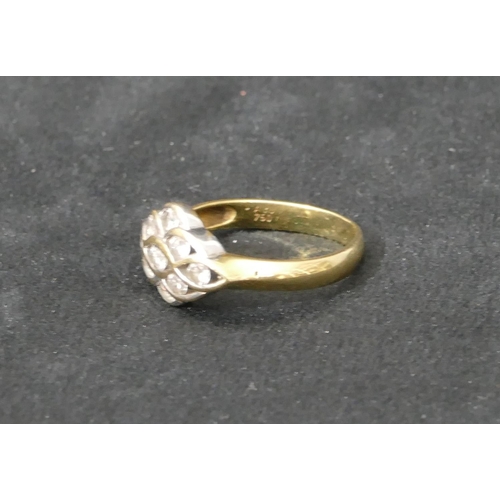 467 - An 18ct gold cluster ring set with clear stones, Size O, 4 grams gross