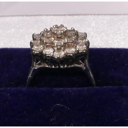 469 - An 18ct white gold ladies waterfall cluster ring set with 19 diamonds, Size R