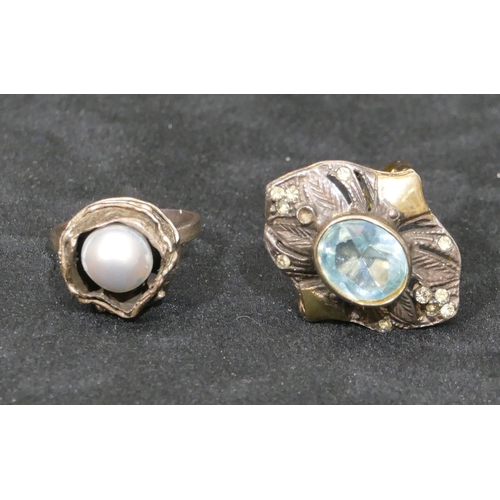 498 - A silver gilt cluster ring set with centre pale blue stone, size Q/R and another silver pearl ring. ... 