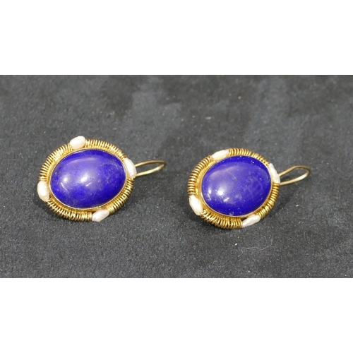 507 - A pair of 925 silver gilt oval lapiz lazuli earrings mounted with freshwater pearls, 3.5cm long over... 