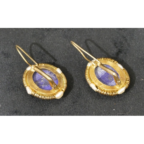 507 - A pair of 925 silver gilt oval lapiz lazuli earrings mounted with freshwater pearls, 3.5cm long over... 