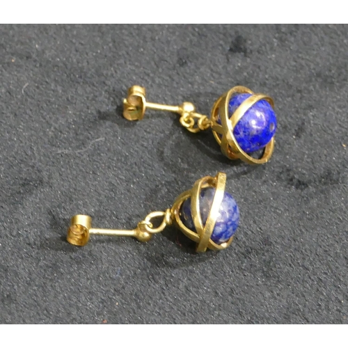 516 - A pair of gold covered lapiz lazuli ball shaped drop earrings, 7.4 grams gross.