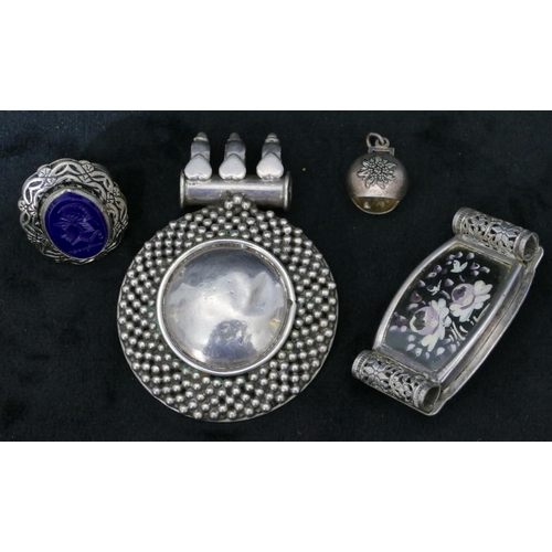 526 - A 925 silver circular drop pendant, another brooch, a silver oval seal ring set with pale blue stone... 