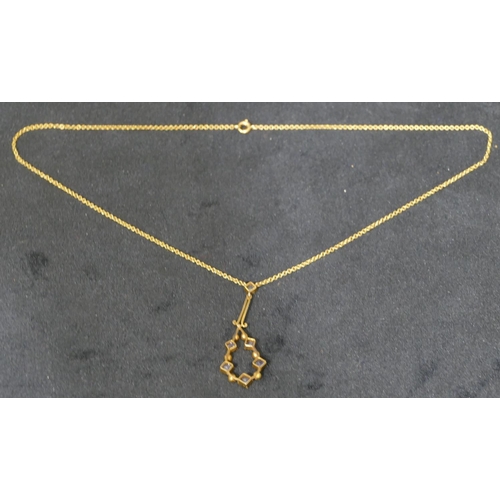 537 - A 15ct gold drop pendant with chain, set with square cut sapphires and half pearls, 37.5cm long, 3.1... 