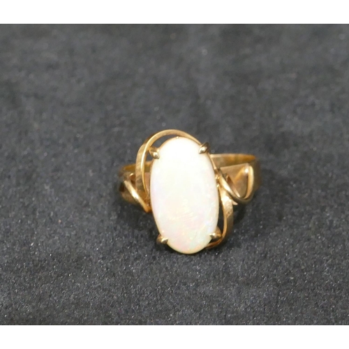 539 - A 9ct gold oval opal ring, size Q, 3.8 grams gross.