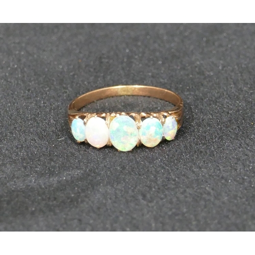 541 - A gold 5 stone opal ladies ring, size P/Q, 2.2 grams gross.