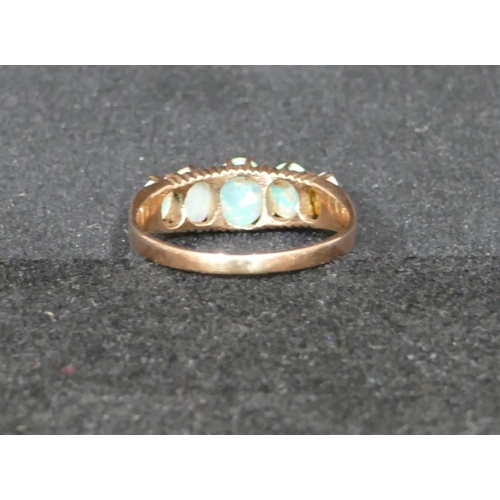 541 - A gold 5 stone opal ladies ring, size P/Q, 2.2 grams gross.