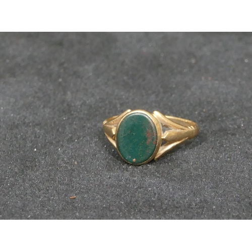 547 - A 9ct gold signet ring set with green stone, size K/L, 2.1 grams gross.