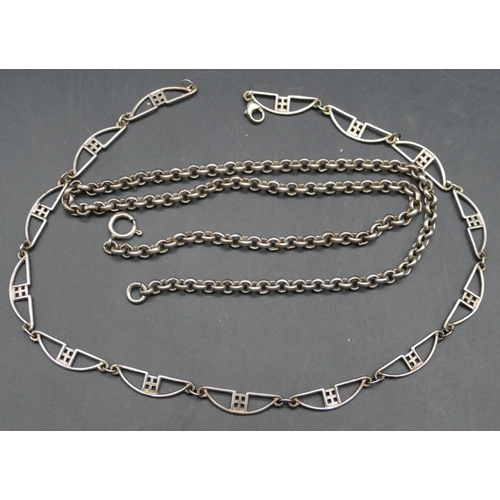 565 - A silver half round linked chain, 42cm long and another silver linked chain, 52.5cm long, 49.7 grams... 