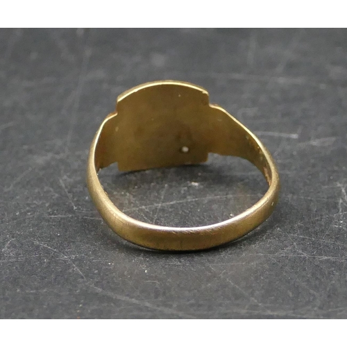 570 - A 9ct gold signet ring, size U/V, 3.8 grams.