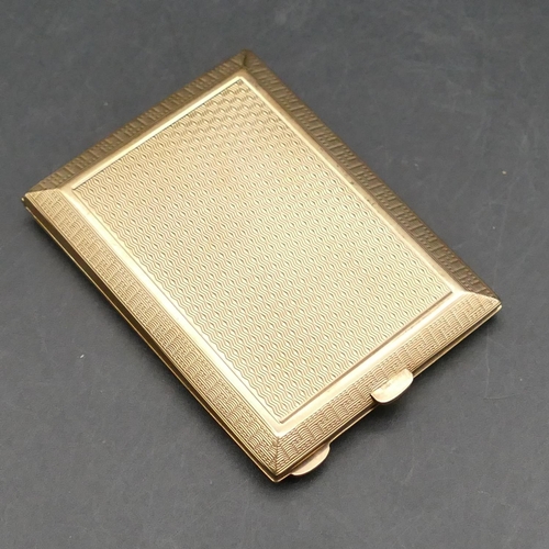 580 - A 9ct gold matchbox case with allover engine turn decoration, hinged front, 6.5cm wide, 33.5 grams.