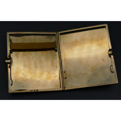 581 - A 14ct gold cigarette case with engine turn decoration, hinged front with sapphire cabochon button, ... 