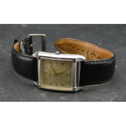 588 - A Winegartens steel square faced gentleman's automatic waterproof wrist watch with leather strap (wi... 