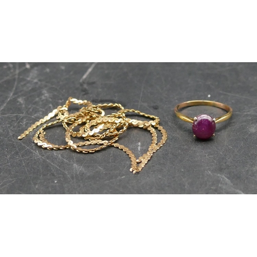 601 - A ladies gold ring set with centre purple stone, Size Q/R, a 9ct gold broken chain (in pieces), ring... 