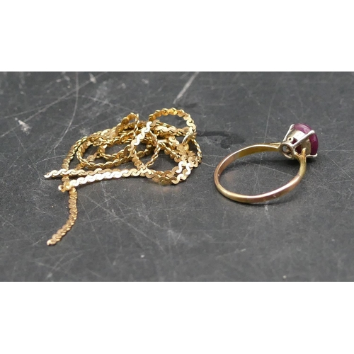 601 - A ladies gold ring set with centre purple stone, Size Q/R, a 9ct gold broken chain (in pieces), ring... 