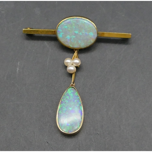 603 - A 9ct gold bar brooch mounted with centre opal, a further drop opal and 3 pearls, 5.2cm high, 4.5 gr... 