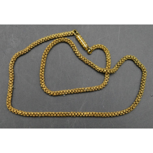 611 - A high carat gold square linked necklace with allover raised ball decoration, 43cm long, 21.6 grams