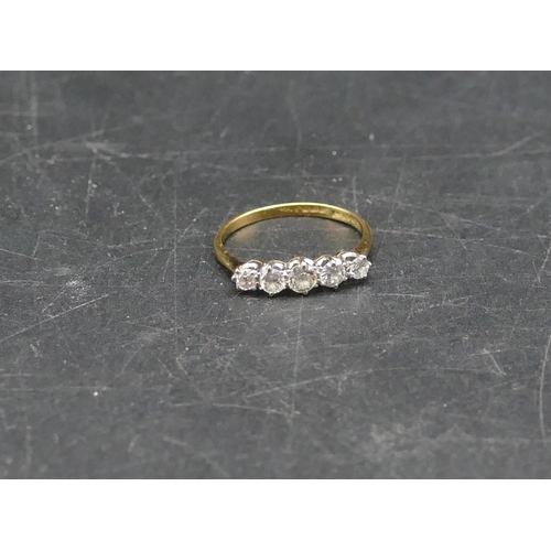 618 - An 18ct gold ladies 5 stone graduated diamond ring, centre diamond approx. 0.15ct, Size M, 1.6 grams... 