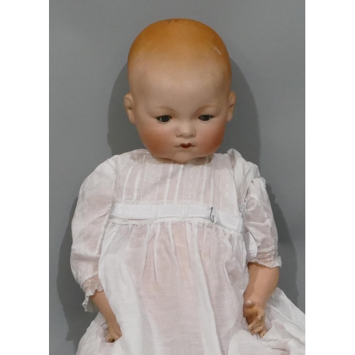 628 - Armand Marseilles porcelain headed doll with closed mouth and closable eyes, jointed body, 59cm long