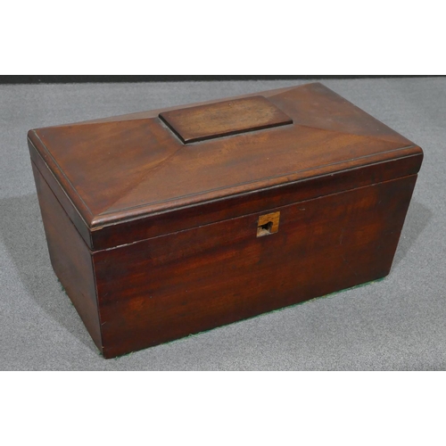 630 - A mahogany sarcophagus shaped tea caddy with hinged lid, enclosing a later glass bowl and 2 lidded c... 