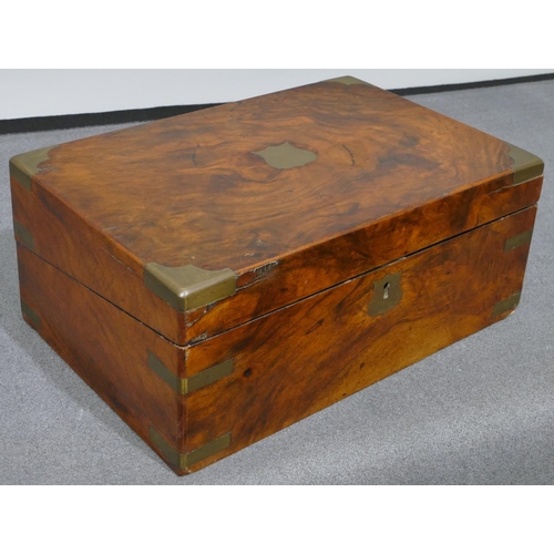 631 - A burr walnut rectangular shaped writing box with brass mounts and corners, hinged top enclosing wri... 