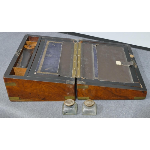 631 - A burr walnut rectangular shaped writing box with brass mounts and corners, hinged top enclosing wri... 