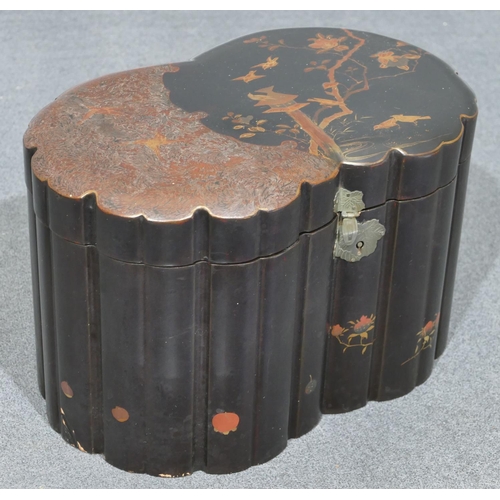 633 - An Oriental black lacquered tea caddy on black ground with allover bird, branch and birdbox decorati... 