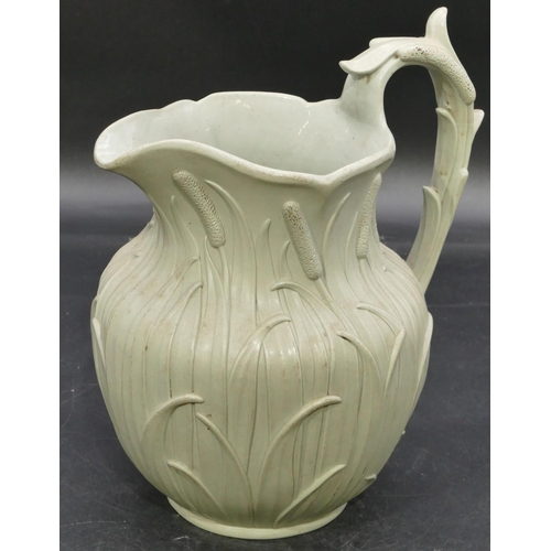 65 - A 19th Century round bulbous shaped jug on pale green ground with raised leaf decoration, 22.5cm hig... 