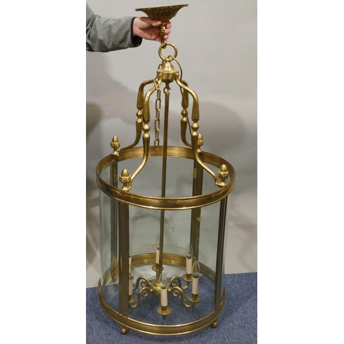 650 - A reproduction large gilt metal circular hanging hall lantern with glass sides, turned acorn motifs,... 