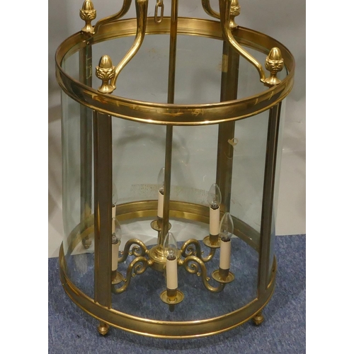 650 - A reproduction large gilt metal circular hanging hall lantern with glass sides, turned acorn motifs,... 