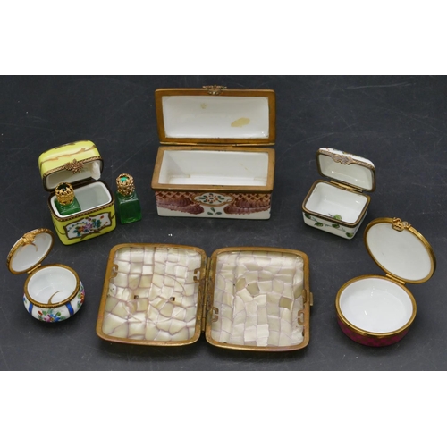 668 - A porcelain rectangular shaped snuff box with hinged lid and gilt metal mounts, on white ground and ... 