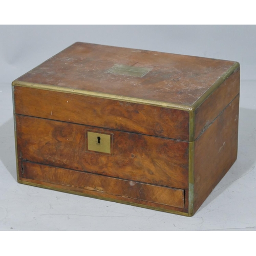 673 - A 19th Century walnut rectangular shaped dressing table box with allover brass banding and mounts, h... 