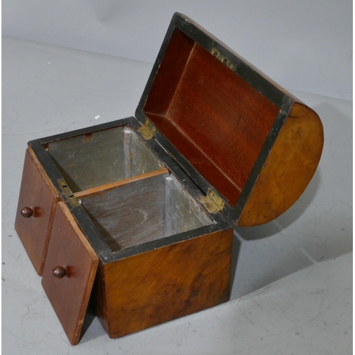 677 - A Victorian walnut dome topped stationery box with inlaid boxing and banding, hinged lid enclosing 2... 