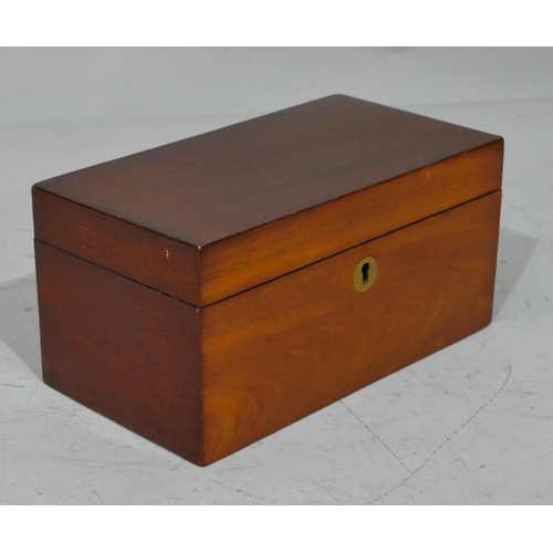 678 - A 19th Century mahogany rectangular shaped tea caddy with hinged lid enclosing 2 lidded compartments... 