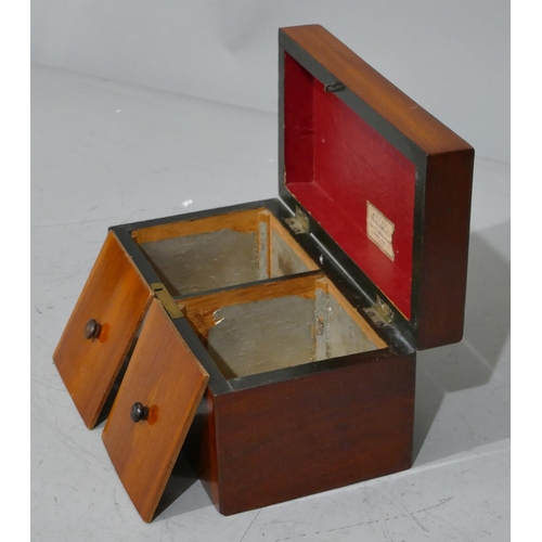 678 - A 19th Century mahogany rectangular shaped tea caddy with hinged lid enclosing 2 lidded compartments... 