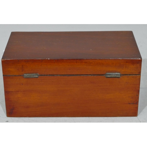 678 - A 19th Century mahogany rectangular shaped tea caddy with hinged lid enclosing 2 lidded compartments... 