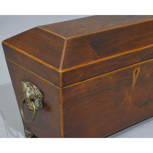 679 - A 19th Century rosewood sarcophagus shaped tea caddy with part inlaid banding, hinged lid enclosing ... 