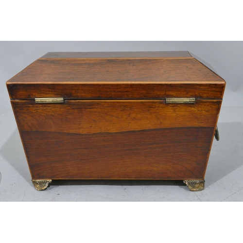 679 - A 19th Century rosewood sarcophagus shaped tea caddy with part inlaid banding, hinged lid enclosing ... 