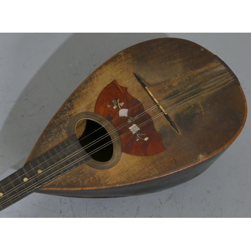 680 - A rosewood mandolin with inlaid Mother of Pearl and tortoiseshell decoration (split to back), cased.