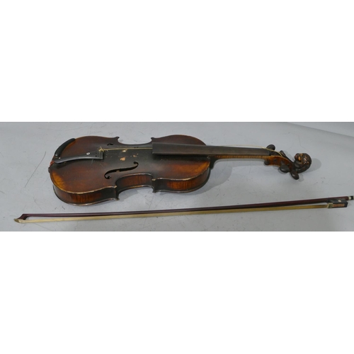 681 - A 2-piece back violin with carved head in the form of an animal, back 35.5cm, with bow, cased.