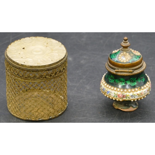 691 - An Oriental gilt metal cylindrical pot with cover with pierced jade top, 6cm high, 6cm diameter, an ... 