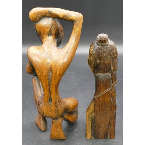 696 - A carved wooden figure of a kneeling gentleman, 30cm high, a carved Eastern figurehead of a lady, 26... 