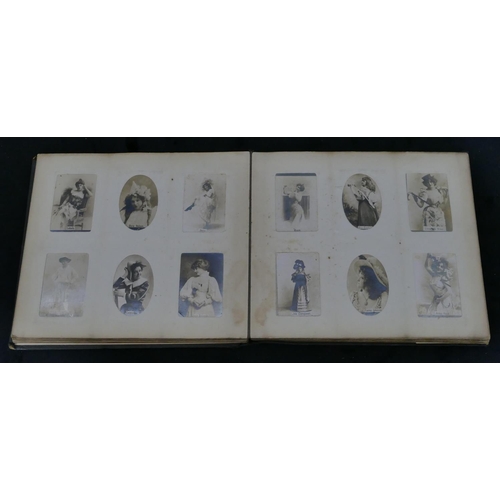 703 - An Ogden's photo album containing black and white cards of various ladies and a set of various milit... 