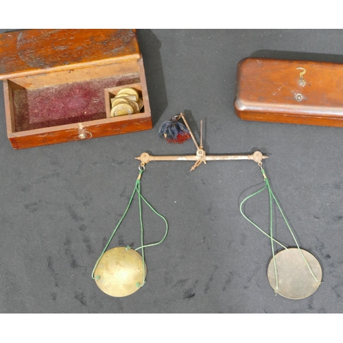 706 - A set of W & T Avery scales with weights, boxed, a 19th century mahogany box containing some weights... 